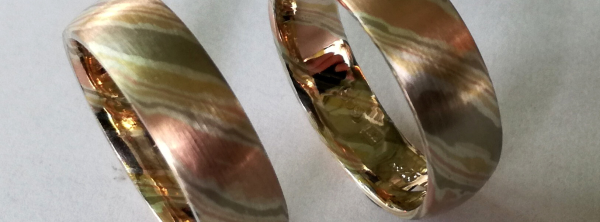 Mokume-gane-trouwringen-vierkleuren.jpg